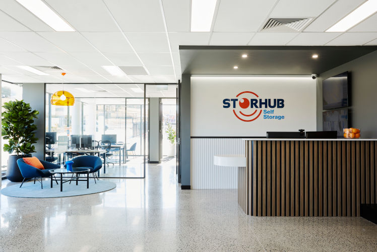 Customers happily using the StorHub self storage units in Rouse Hill