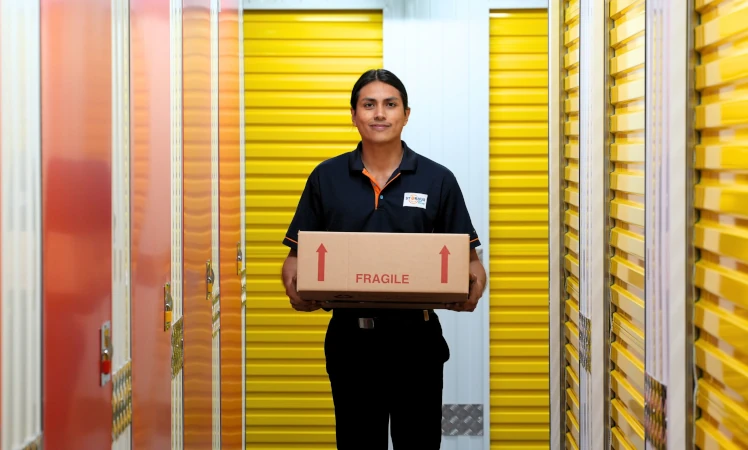 A climate-controlled storage unit with neatly stored wine bottles.